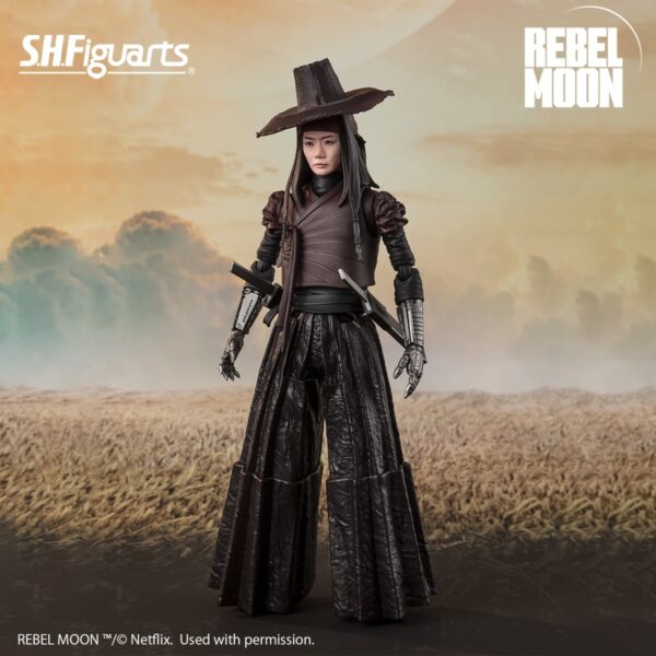 Tamashii Nations presenta, dentro de la colección S.H. Figuarts, la figura de Nemesis. Está basada en el personaje de la nueva película de Netflix "Rebel Moon Part One: Child of Fire" y mide 15 cm. Contiene 2x pares de manos intercambiables, 2x partes de las espadas con efectos, 1x sombrero y 2x espadas. Puedes exponerla junto a las figuras de S.H. Figuarts Kora y Jimmy (se venden por separado).