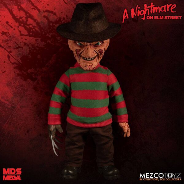 Figuras Pesadilla en Elm Street Figura articulada parlante con accesorios de la película ´Pesadilla en Elm Street´, tamaño aprox. 38 cm. Viene en una caja con ventana. Funciona con 3x Pilas LR44, incluidas.